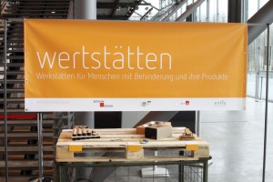 Poster mit Werbung für die Ausstellung Wertstätten